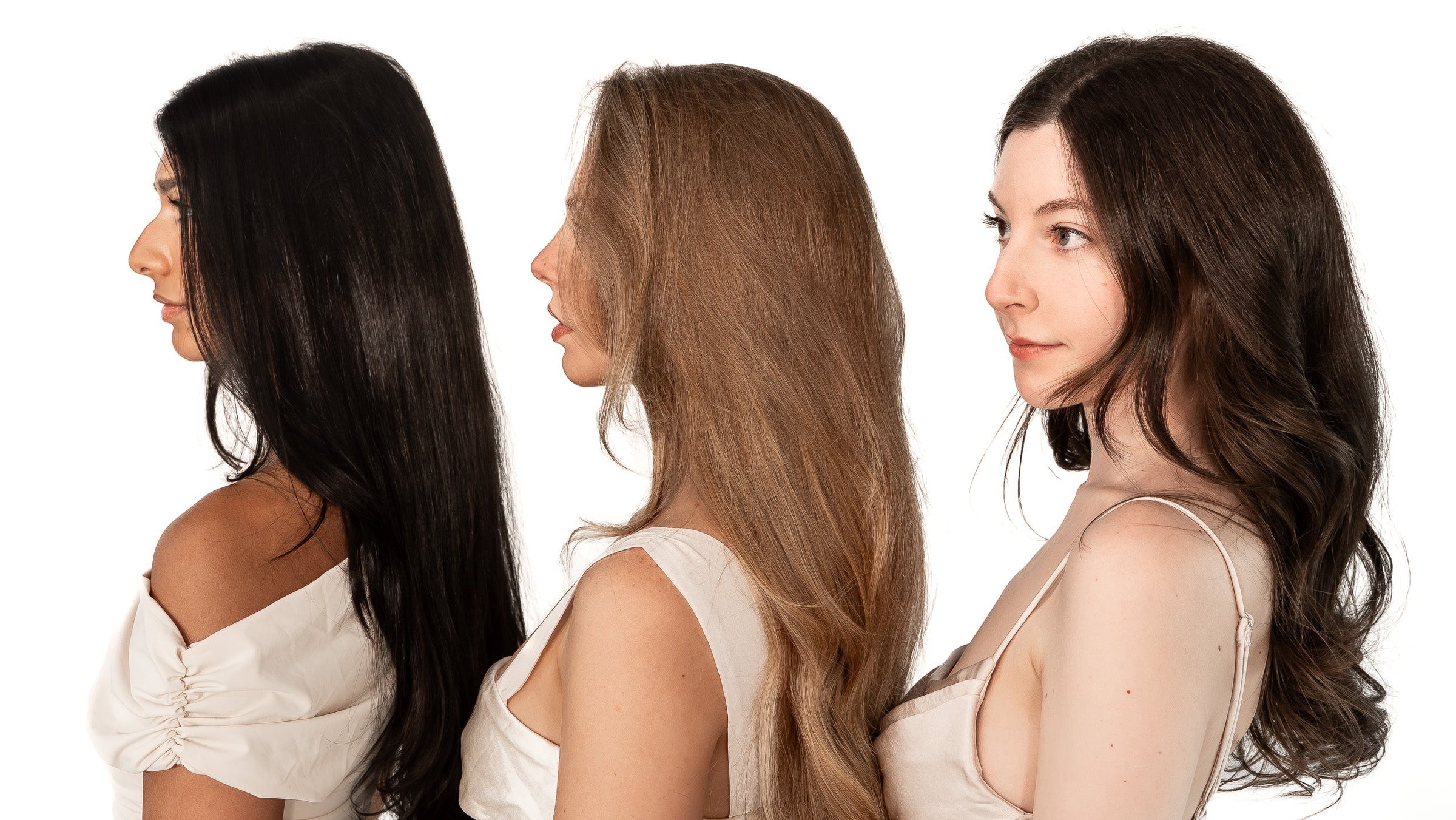 Three women with different hair colors and styles on a white background