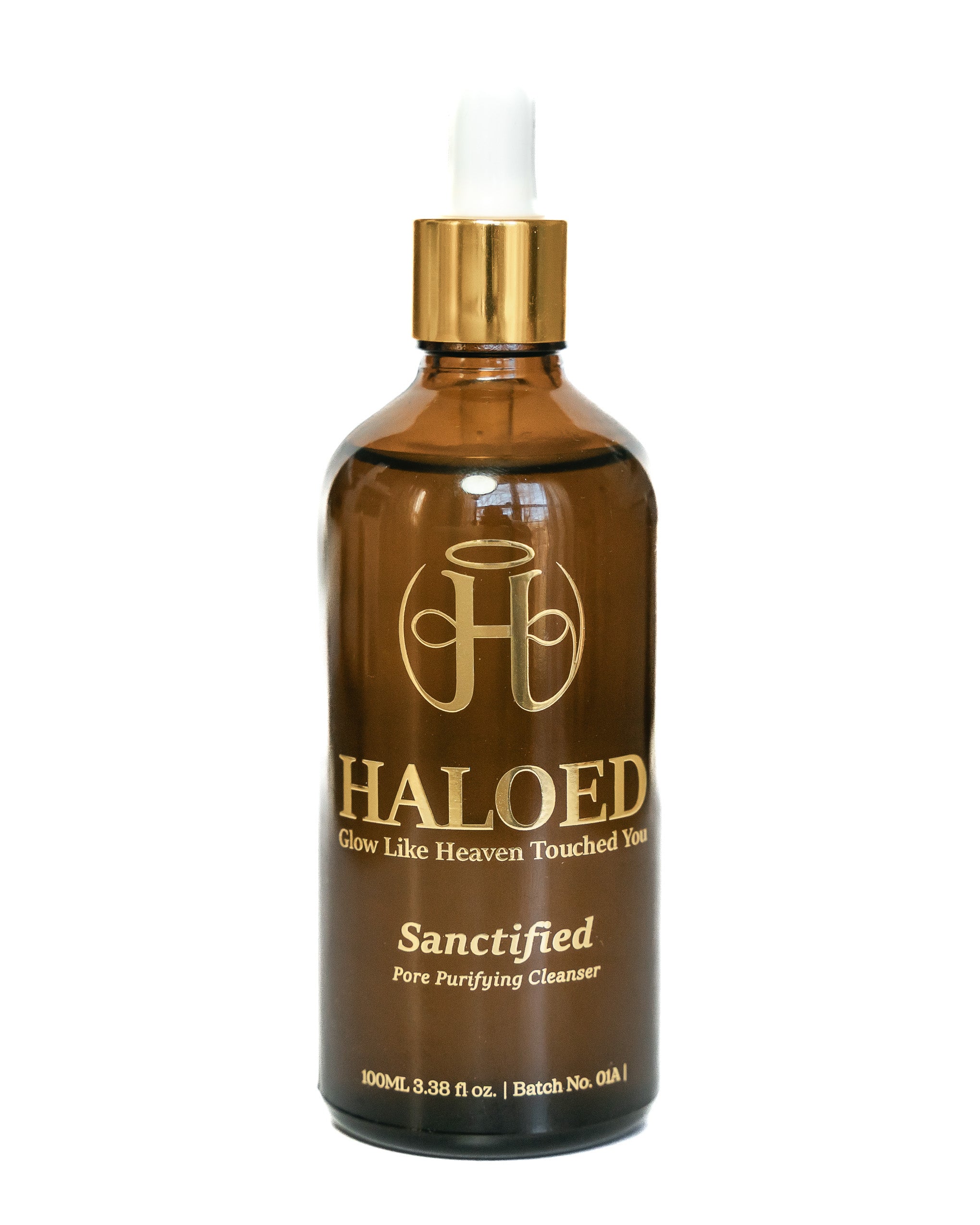 Brown bottle with gold cap and label on a white background